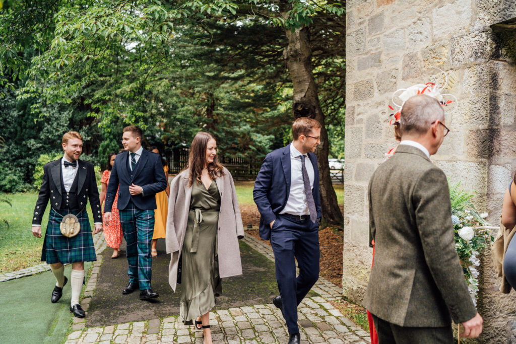 Guests arriving at Carberry Tower wedding