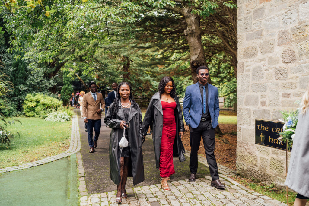 Guests arrive at Carberry Tower wedding