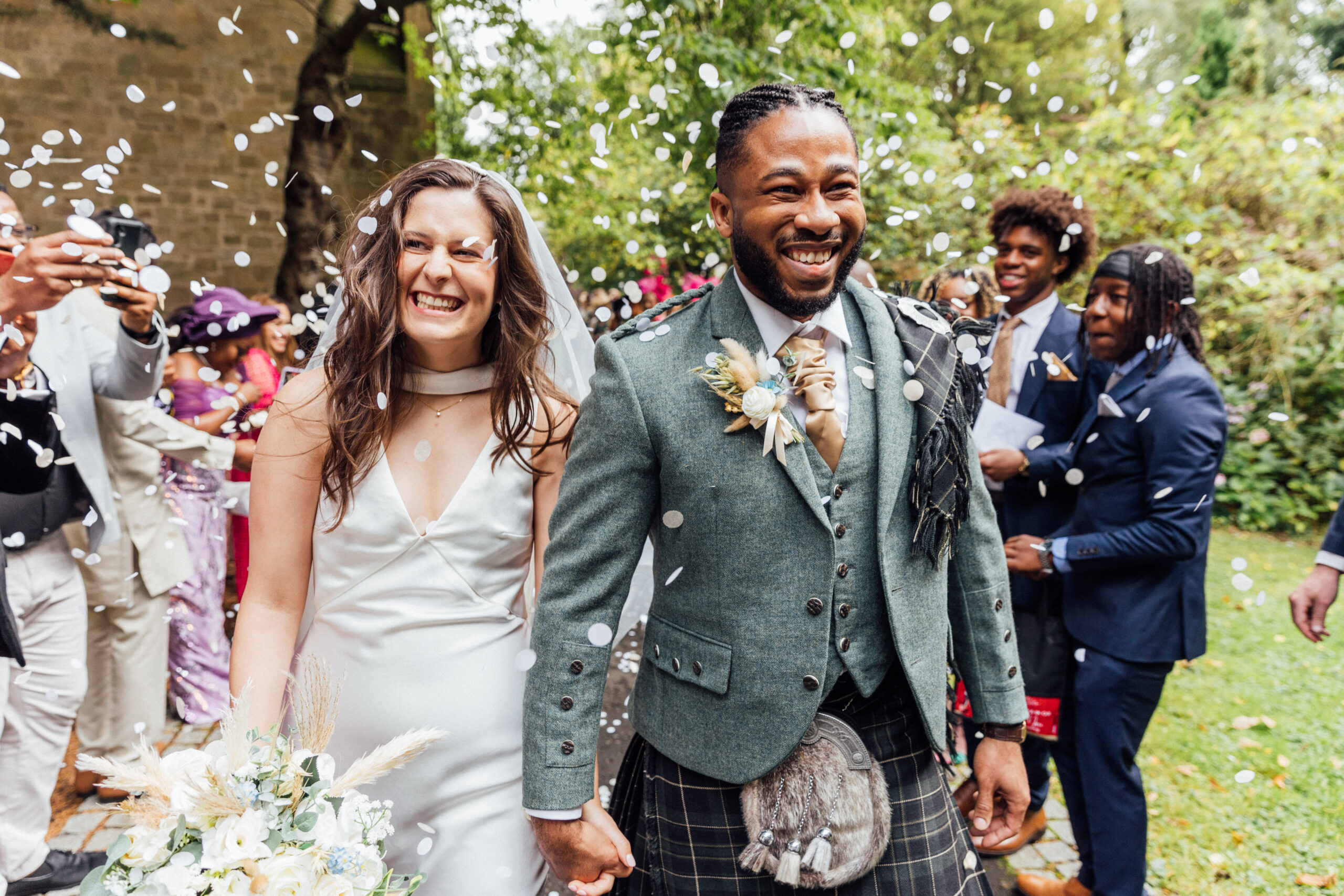 Confetti exit at Carberry Tower wedding