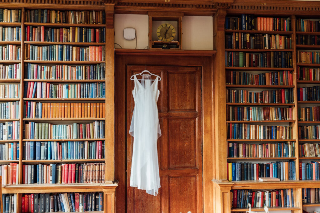 Bride's dress in the library at Carberry Tower wedding