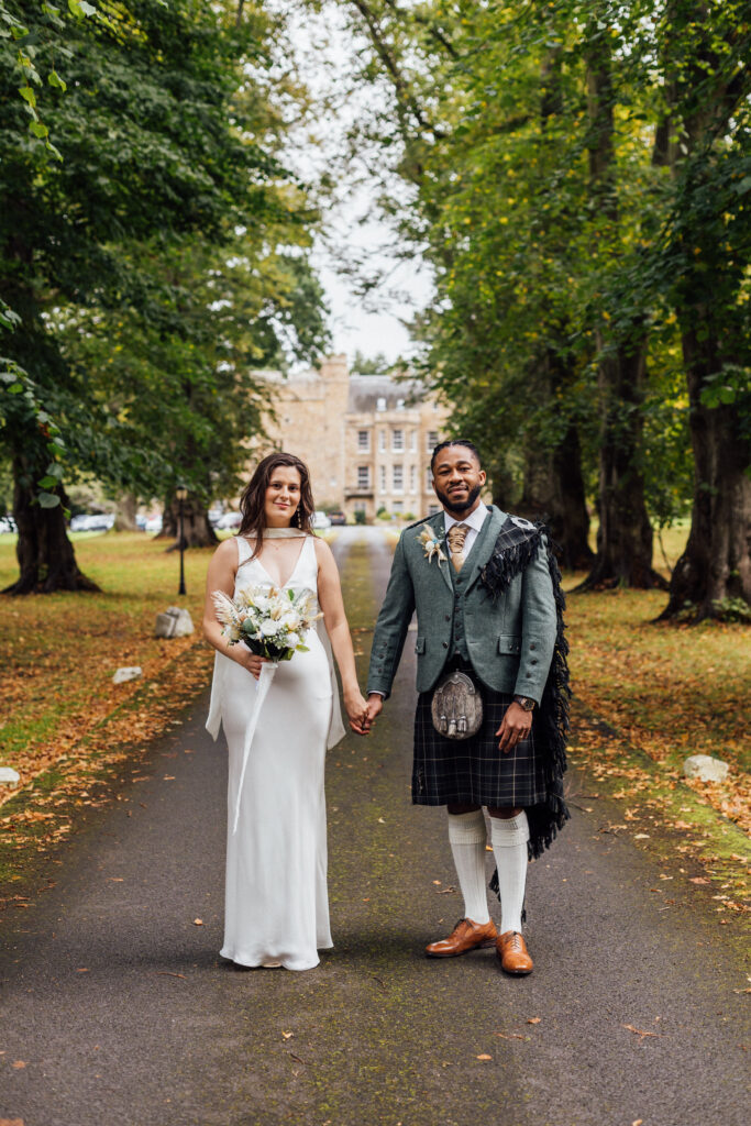 Bride and groom at Carberry Tower wedding