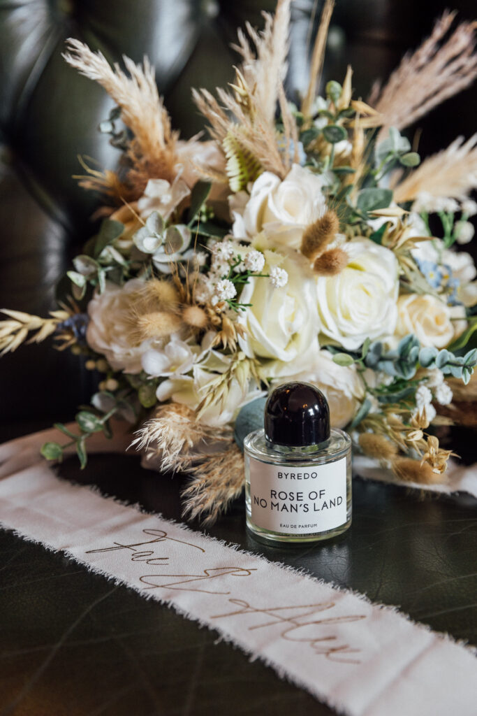 Perfume and bouquet at Carberry Tower wedding