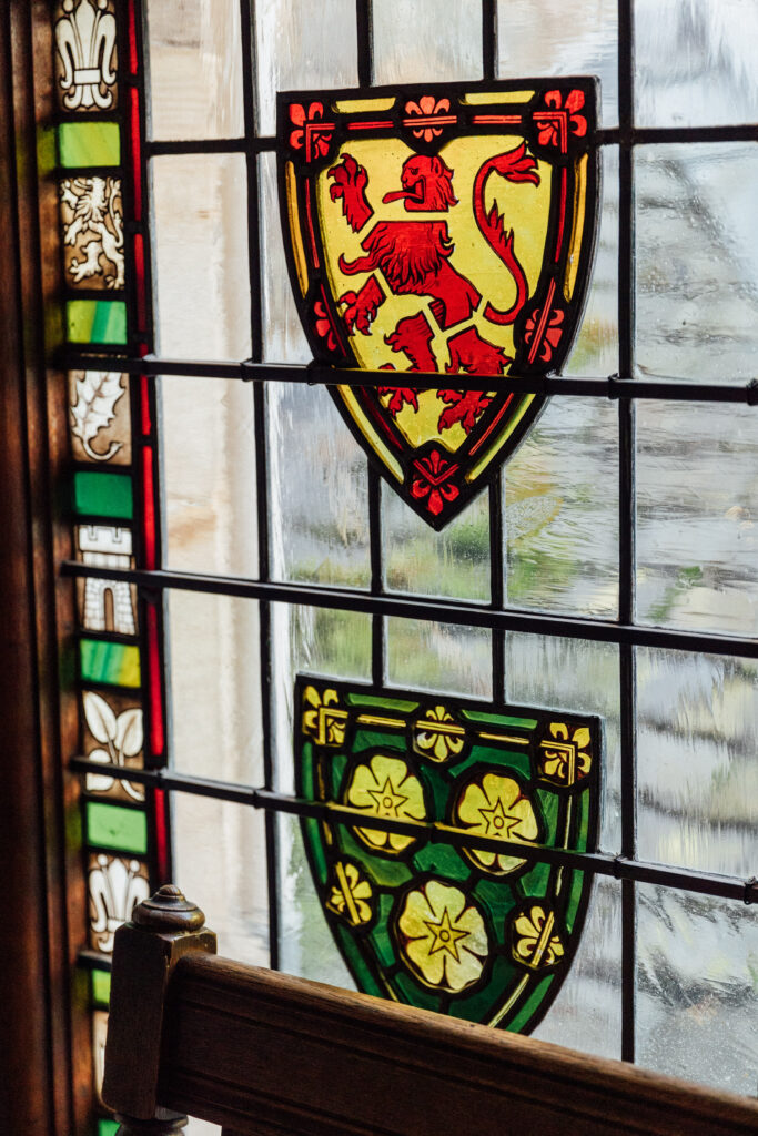 Historic stained glass at Carberry Tower wedding