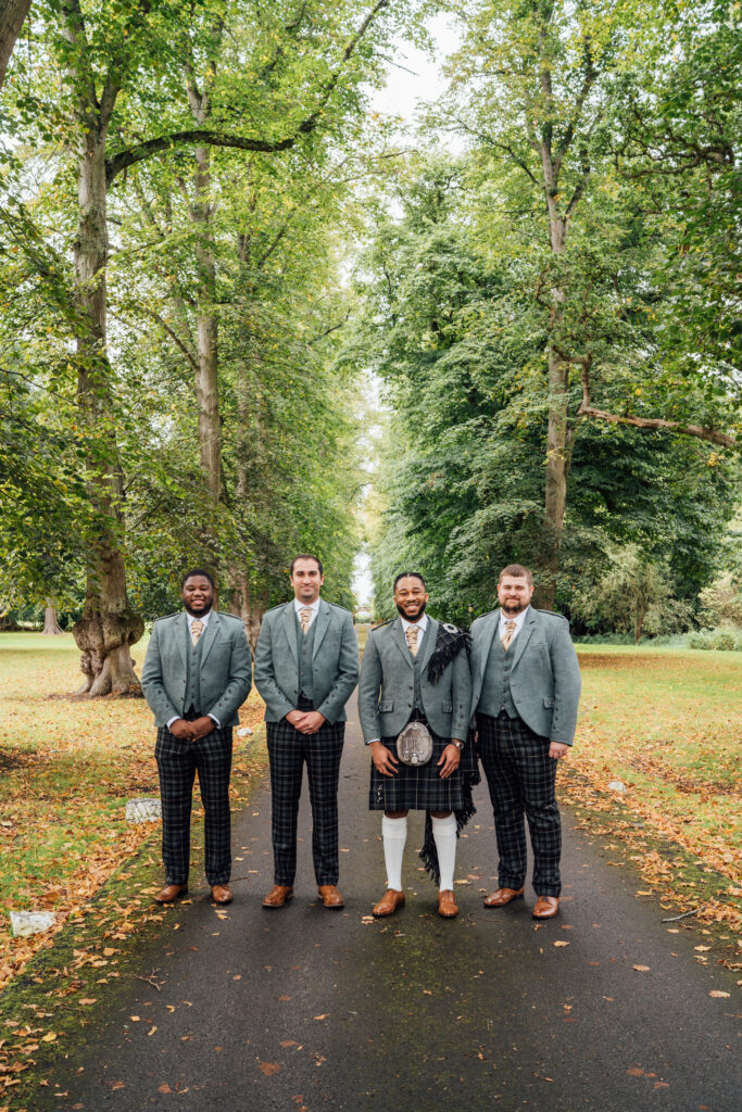 Groom and groomsmen at Carberry Tower wedding