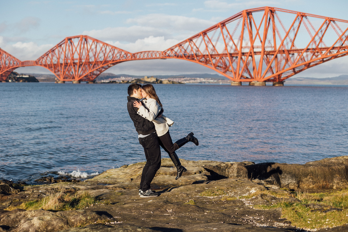A couple kisses during their Edinburgh engagement session