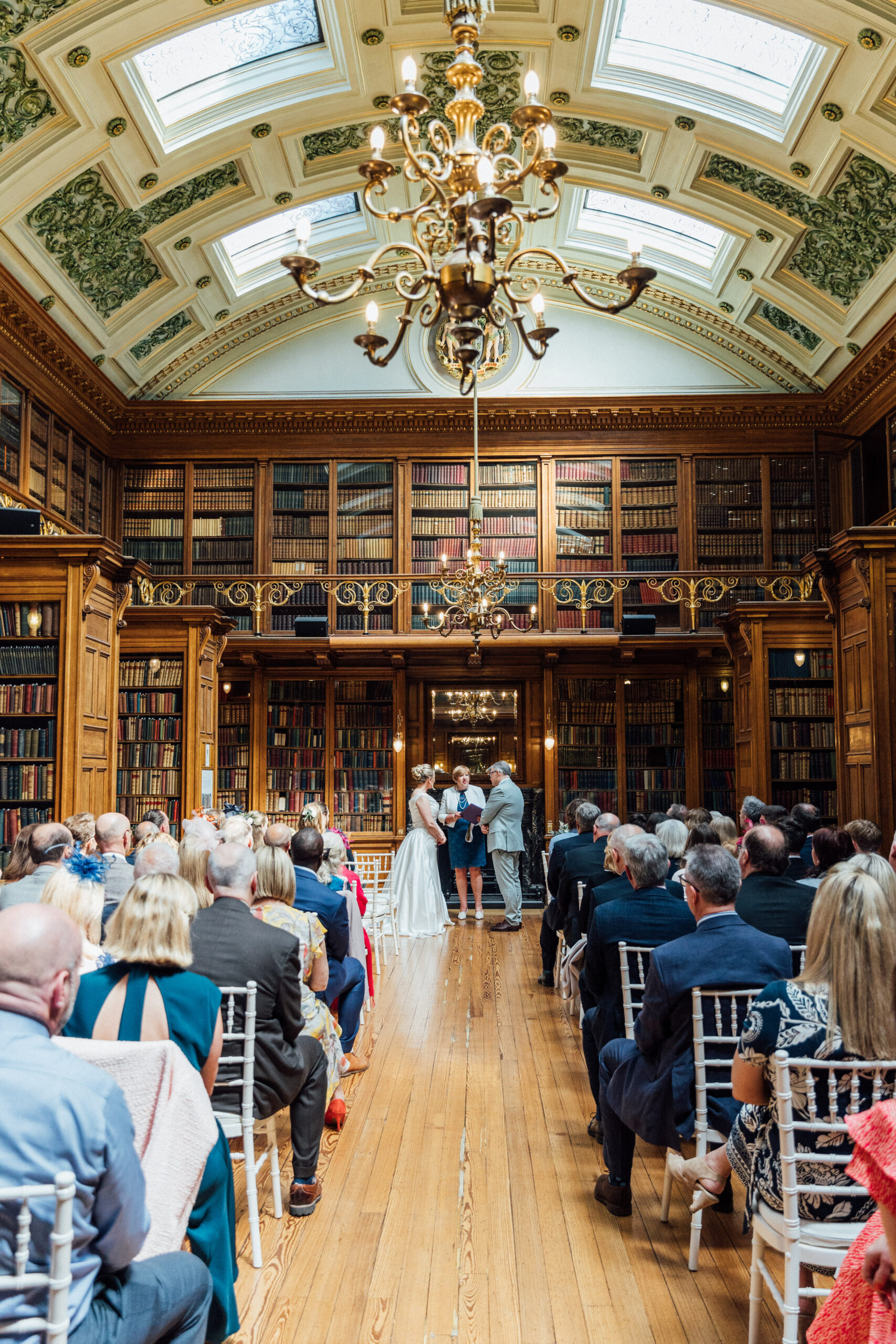 Bride and groom get married in library at Royal College Physicians Edinburgh