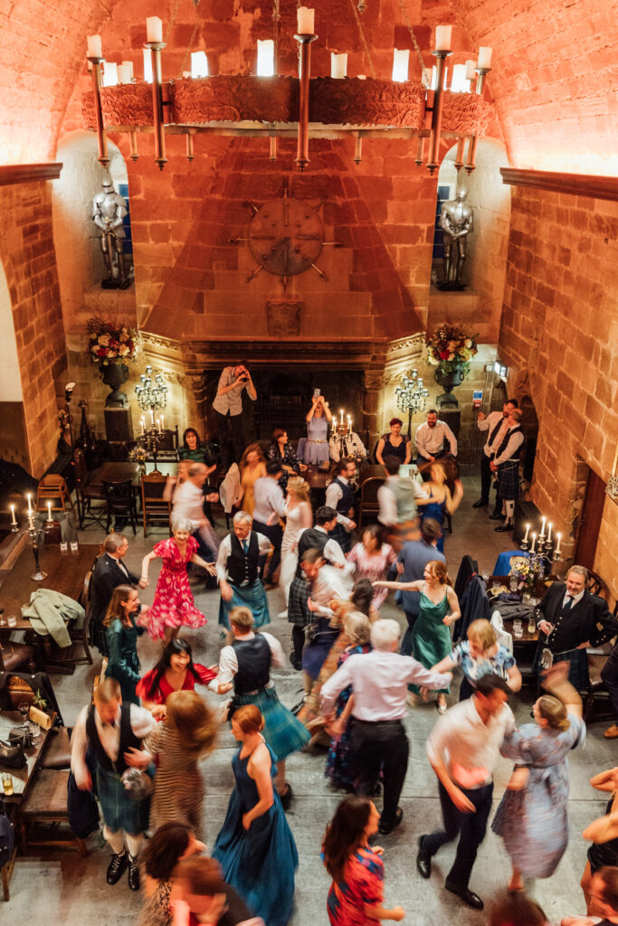 Wedding guests dance at Borthwick Castle